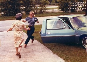 woman running toward daughter to hug